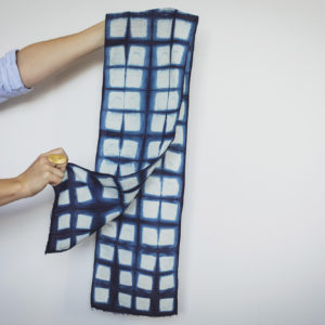 Blue and white checked patterned indigo scarf