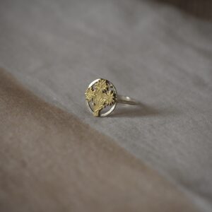 Brass and silver floral ring made from a vintage coin